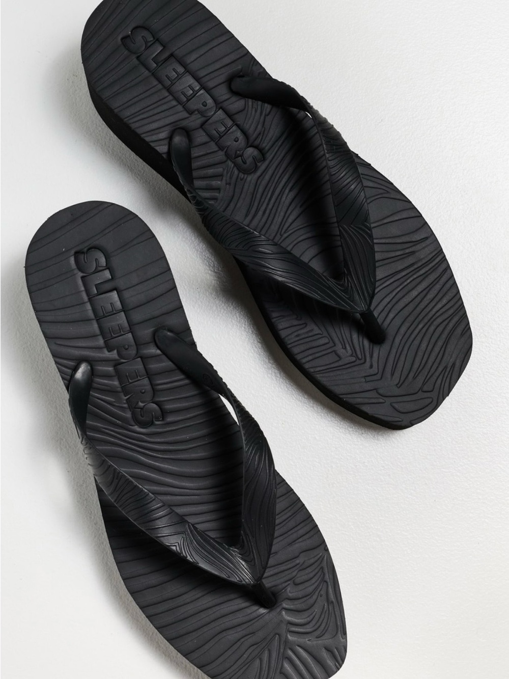 Sleeper Women's Black Textured Rubber Flip-Flop Sandals